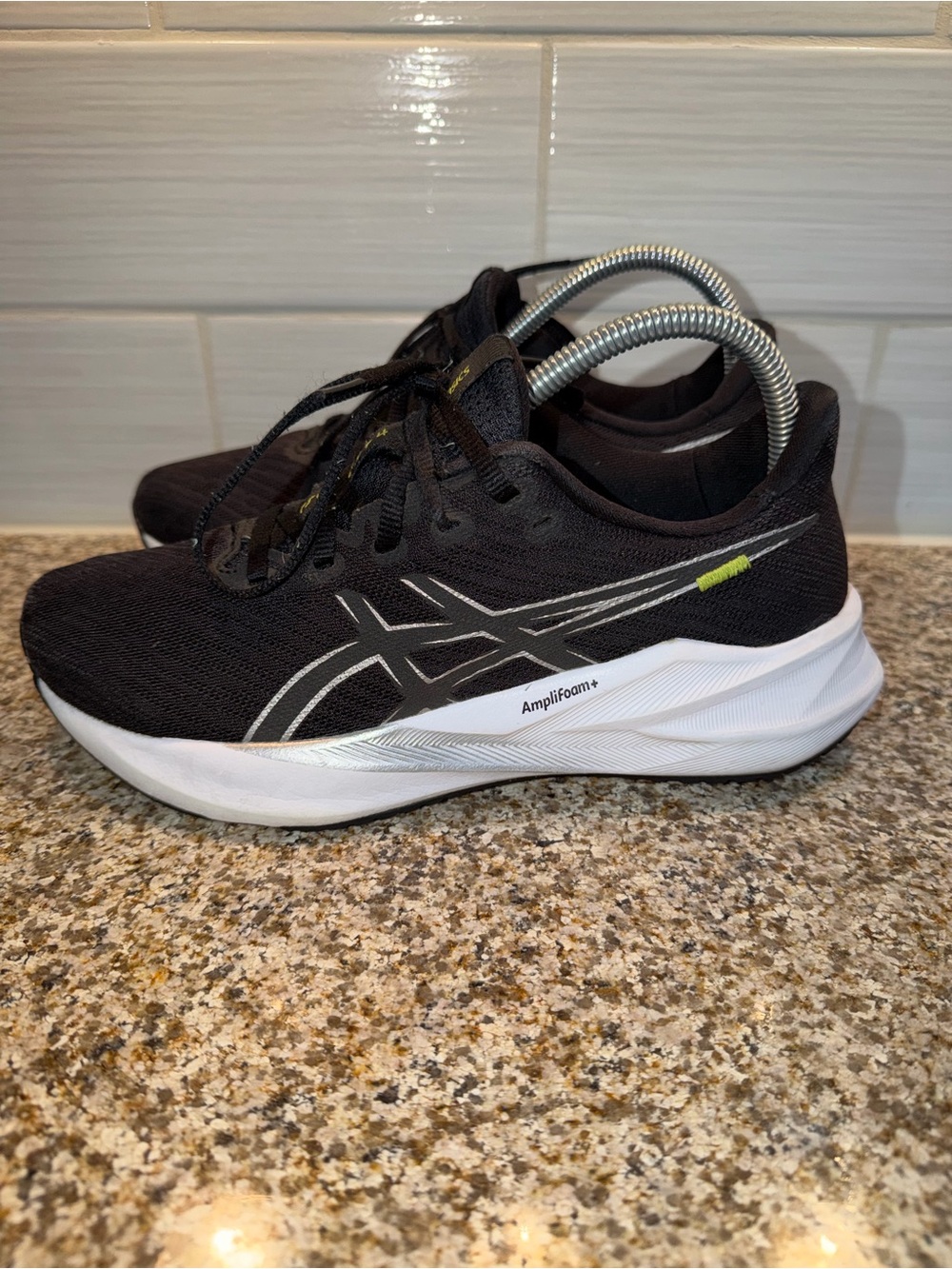 ASICS Black Sneakers with White Midsole and Silver Accents